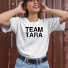 Hunter Woodhall Wearing Team Tara Shirt